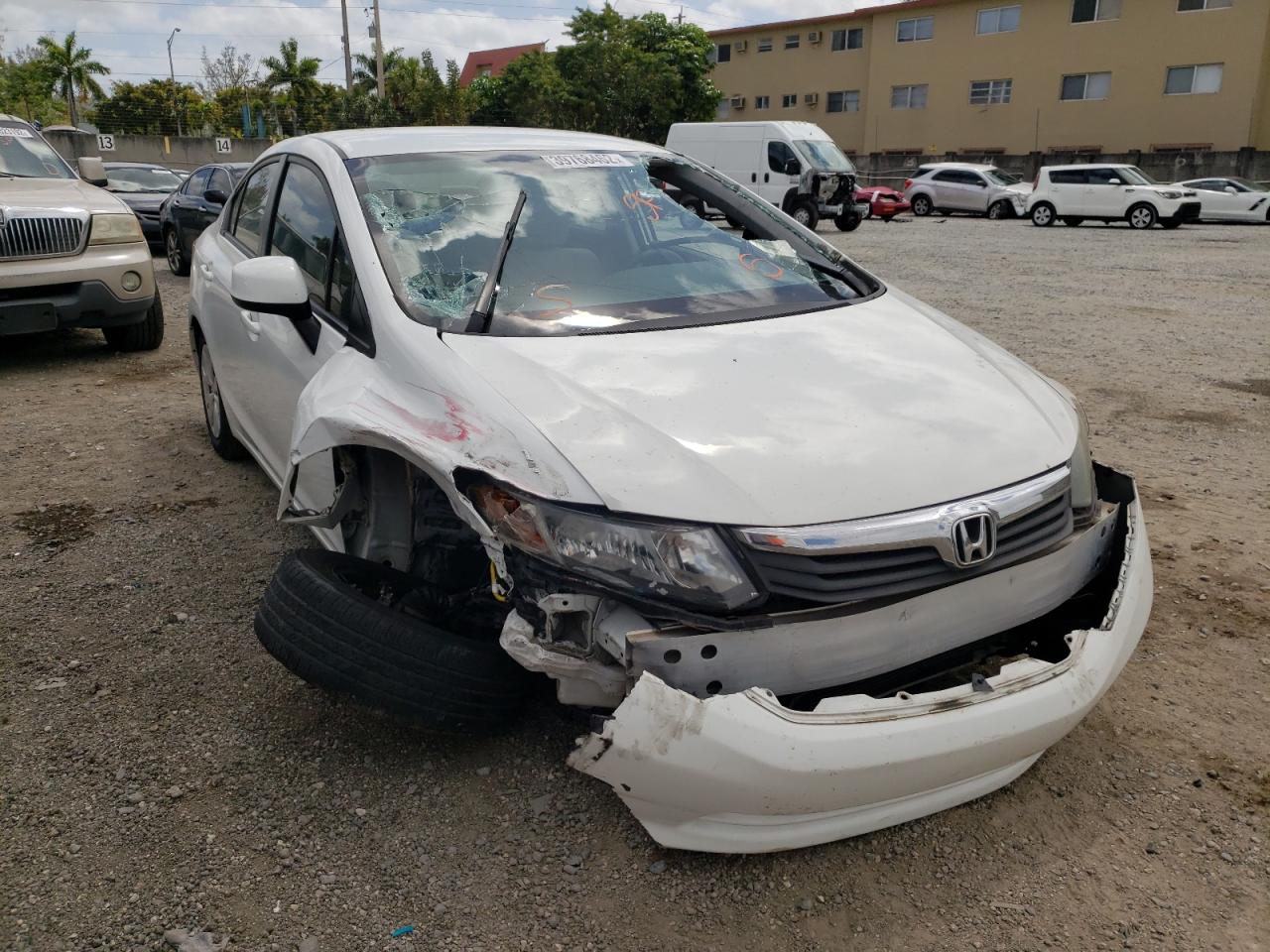 HONDA CIVIC LX 2012 with VIN 19XFB2F56CE072545 - Photo from auction