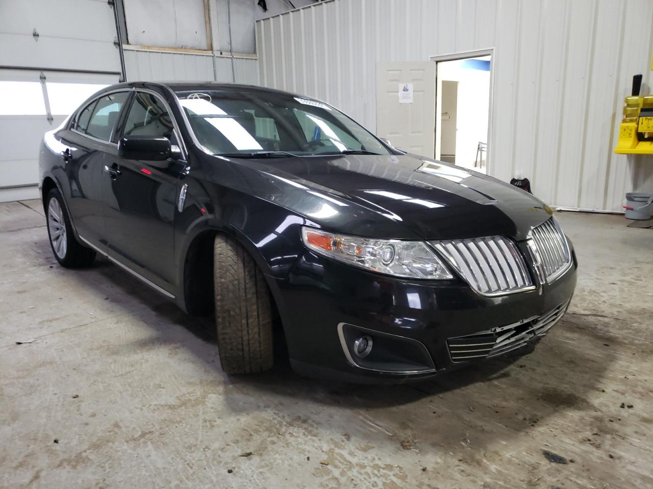 LINCOLN MKS 2011 with VIN 1LNHL9ER3BG602385 - Photo from auction