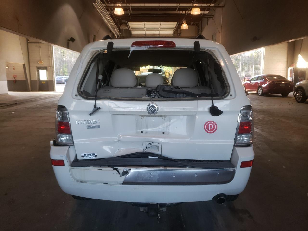 Photo 9 from auction – 2010 MERCURY MARINER PR with VIN 4M2CN8H78AKJ04881