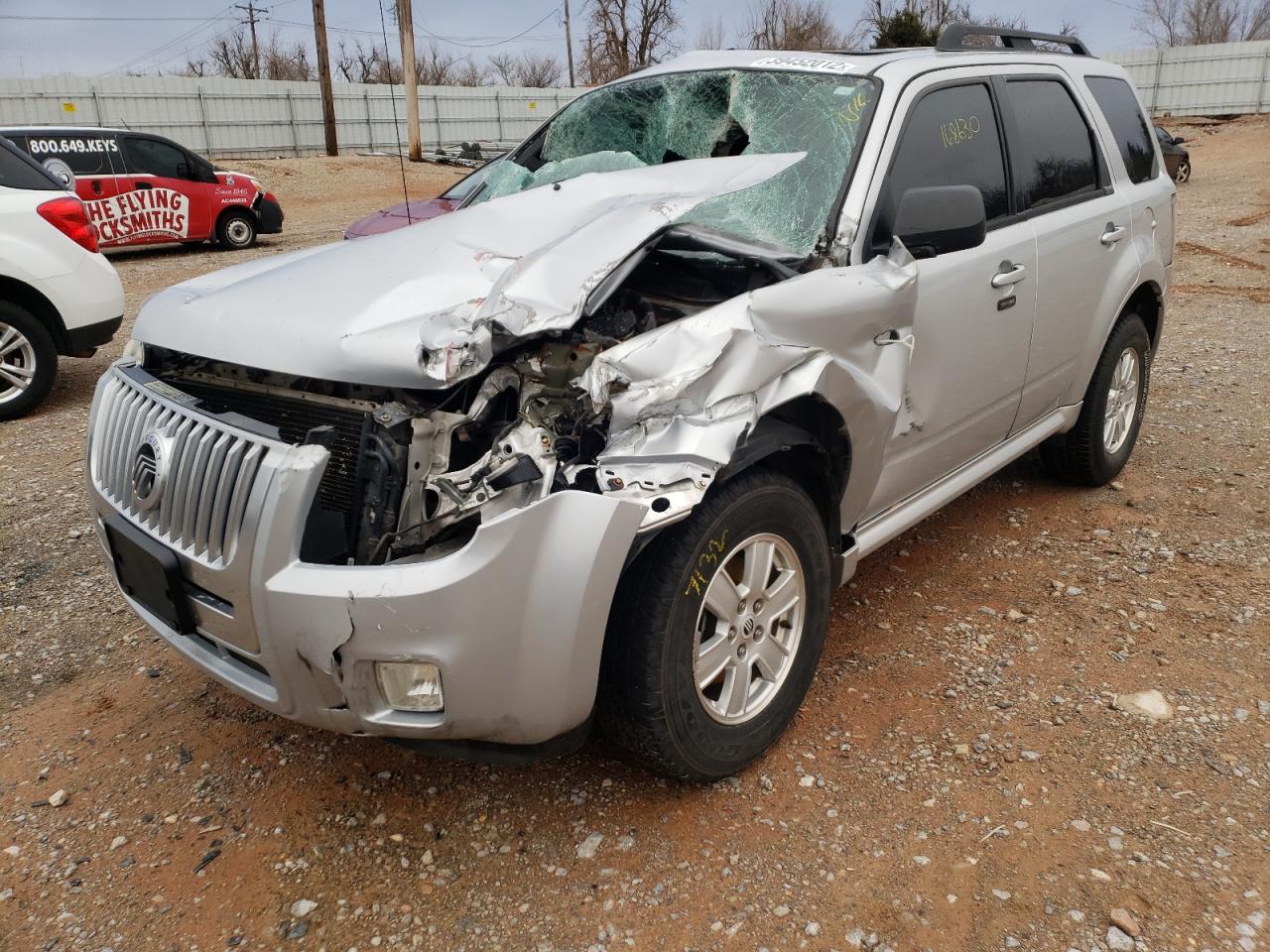 Photo 2 from auction – 2011 MERCURY MARINER with VIN 4M2CN8B73BKJ06452