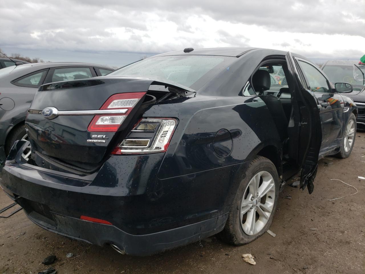 Photo 4 from auction – 2015 FORD TAURUS SEL with VIN 1FAHP2E89FG123746