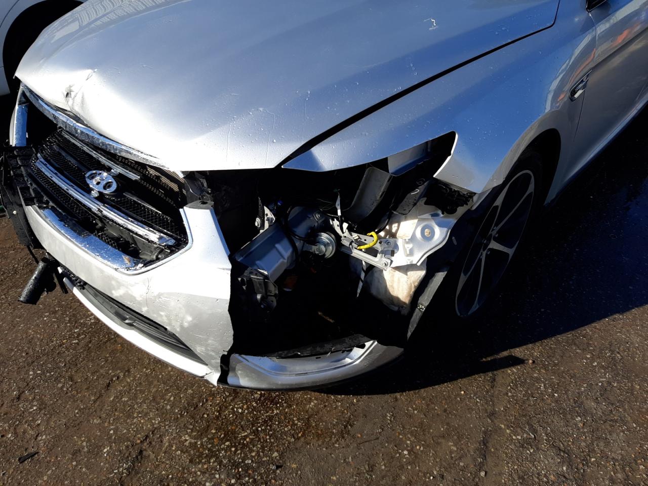 Photo 9 from auction – 2014 FORD TAURUS SEL with VIN 1FAHP2E89EG130579