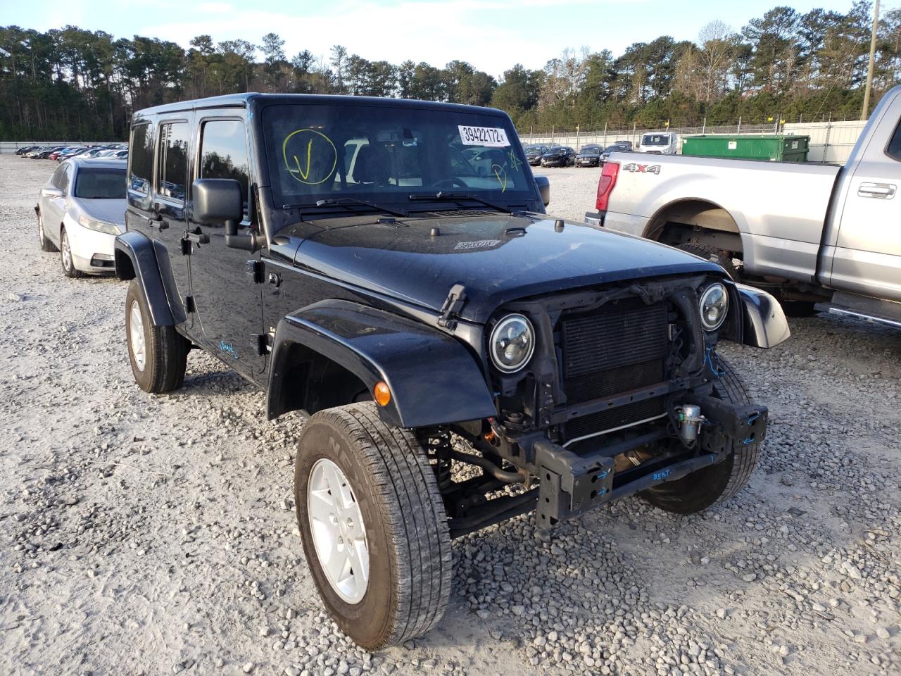 JEEP WRANGLER U 2015 with VIN 1C4BJWEG3FL629953 - Photo from auction