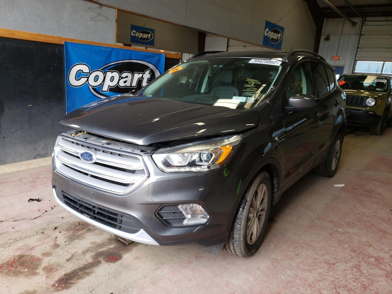Photo 2 from auction – 2018 FORD ESCAPE SEL with VIN 1FMCU0HD9JUA19161