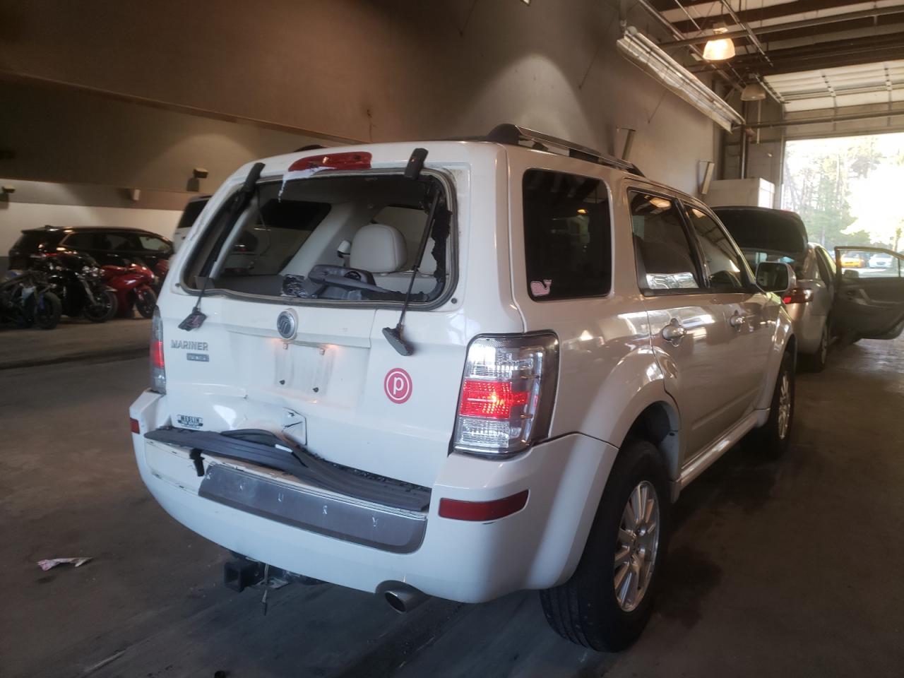 Photo 4 from auction – 2010 MERCURY MARINER PR with VIN 4M2CN8H78AKJ04881