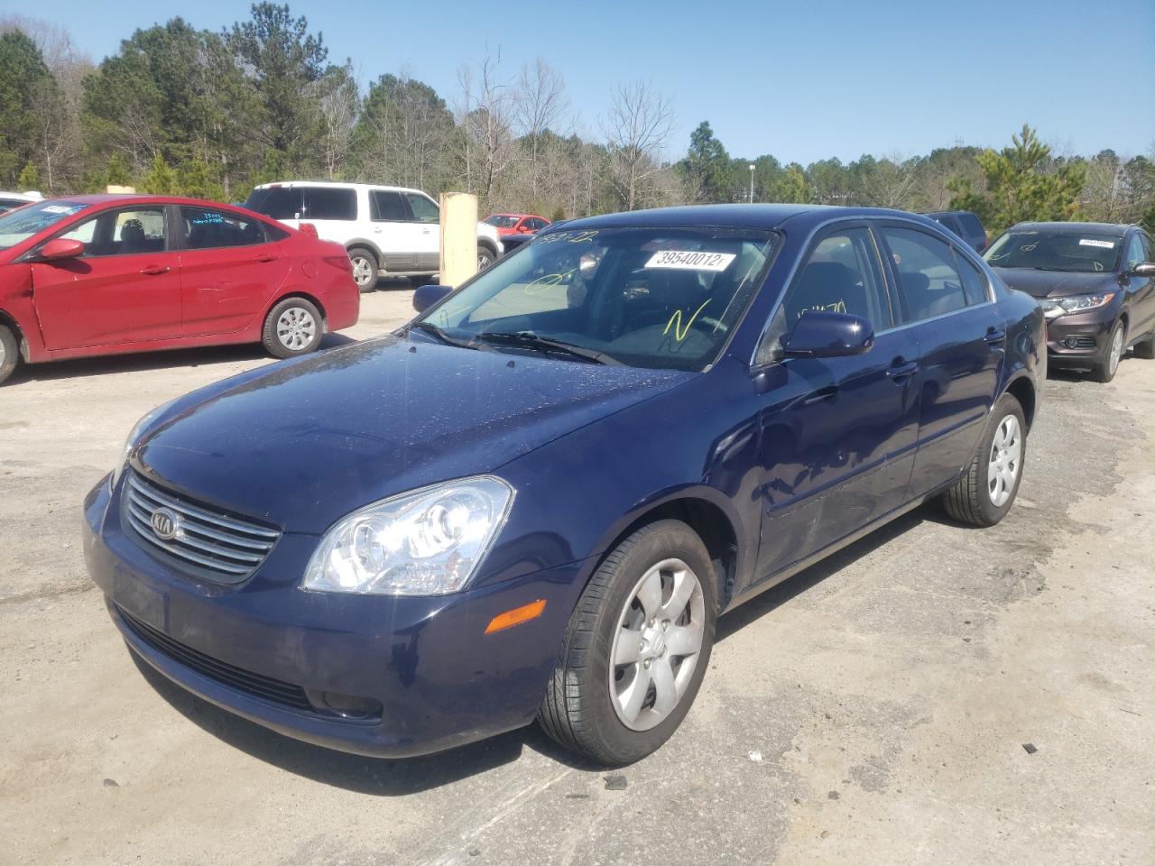 Photo 2 from auction – 2006 KIA OPTIMA LX with VIN KNAGE123765067247