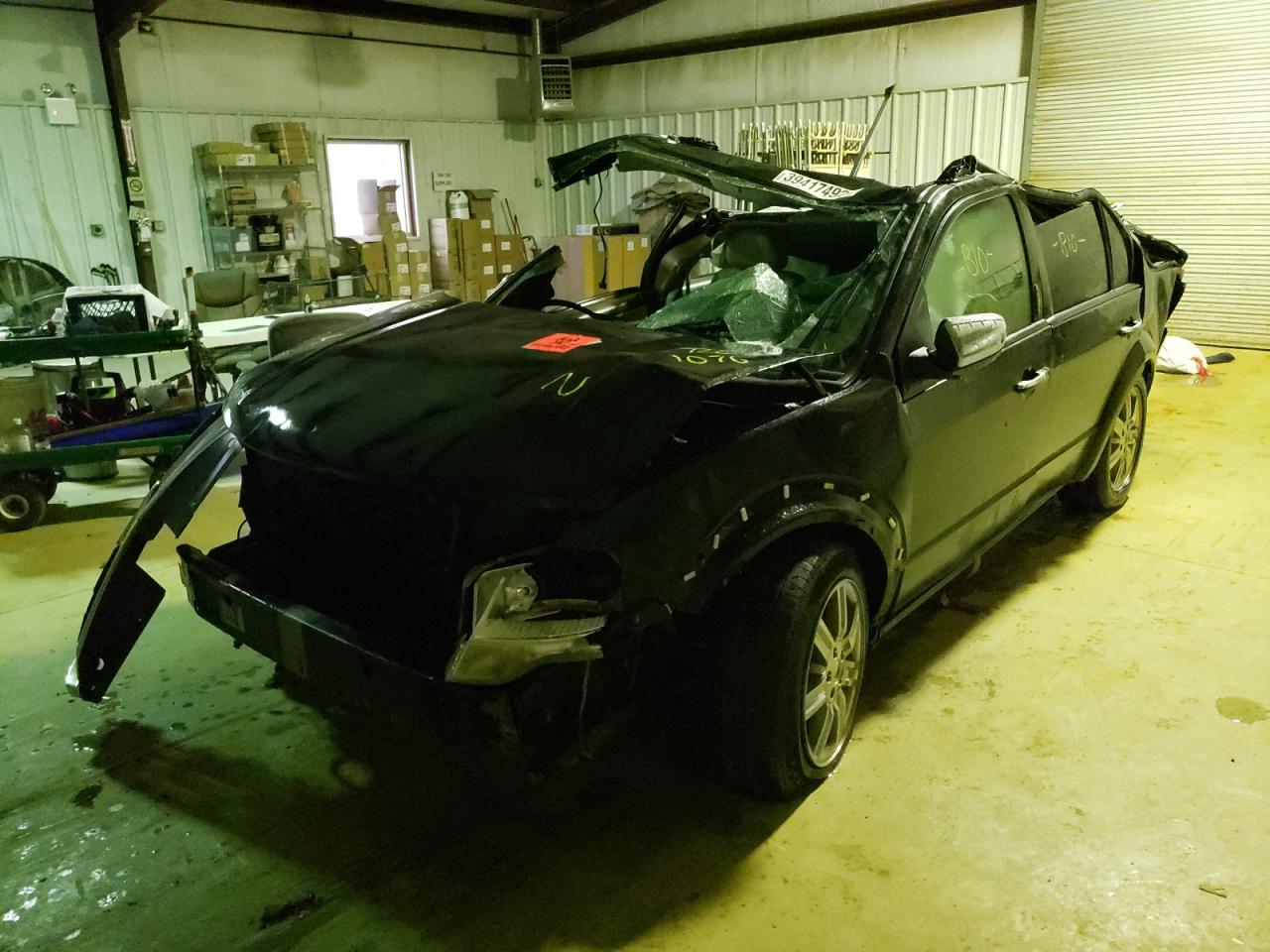Photo 2 from auction – 2008 FORD TAURUS X L with VIN 1FMDK03W08GA01076