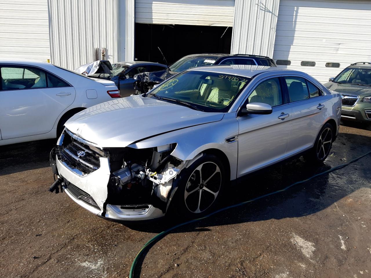 Photo 2 from auction – 2014 FORD TAURUS SEL with VIN 1FAHP2E89EG130579