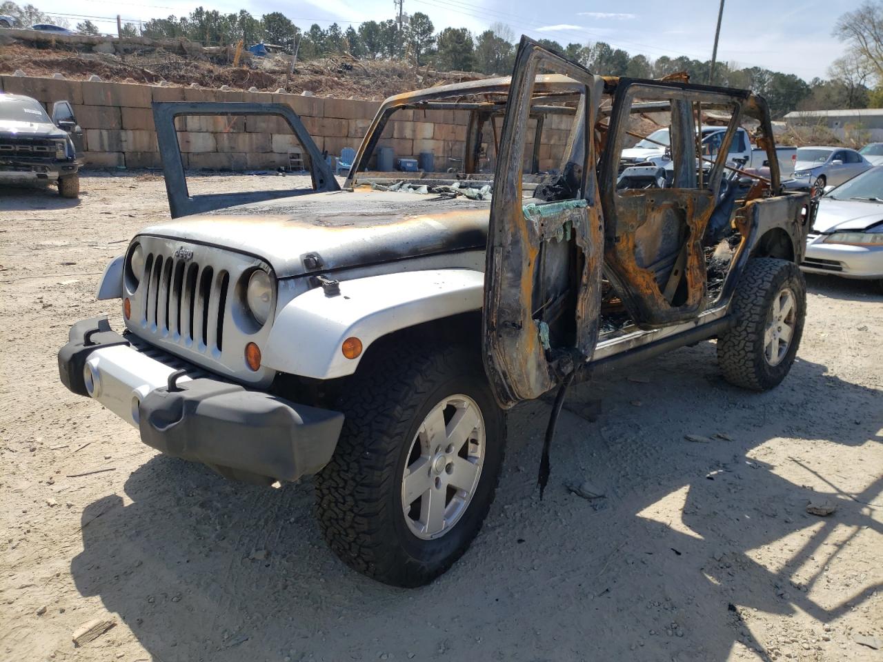 Photo 2 from auction – 2010 JEEP WRANGLER U with VIN 1J4BA5H16AL225954