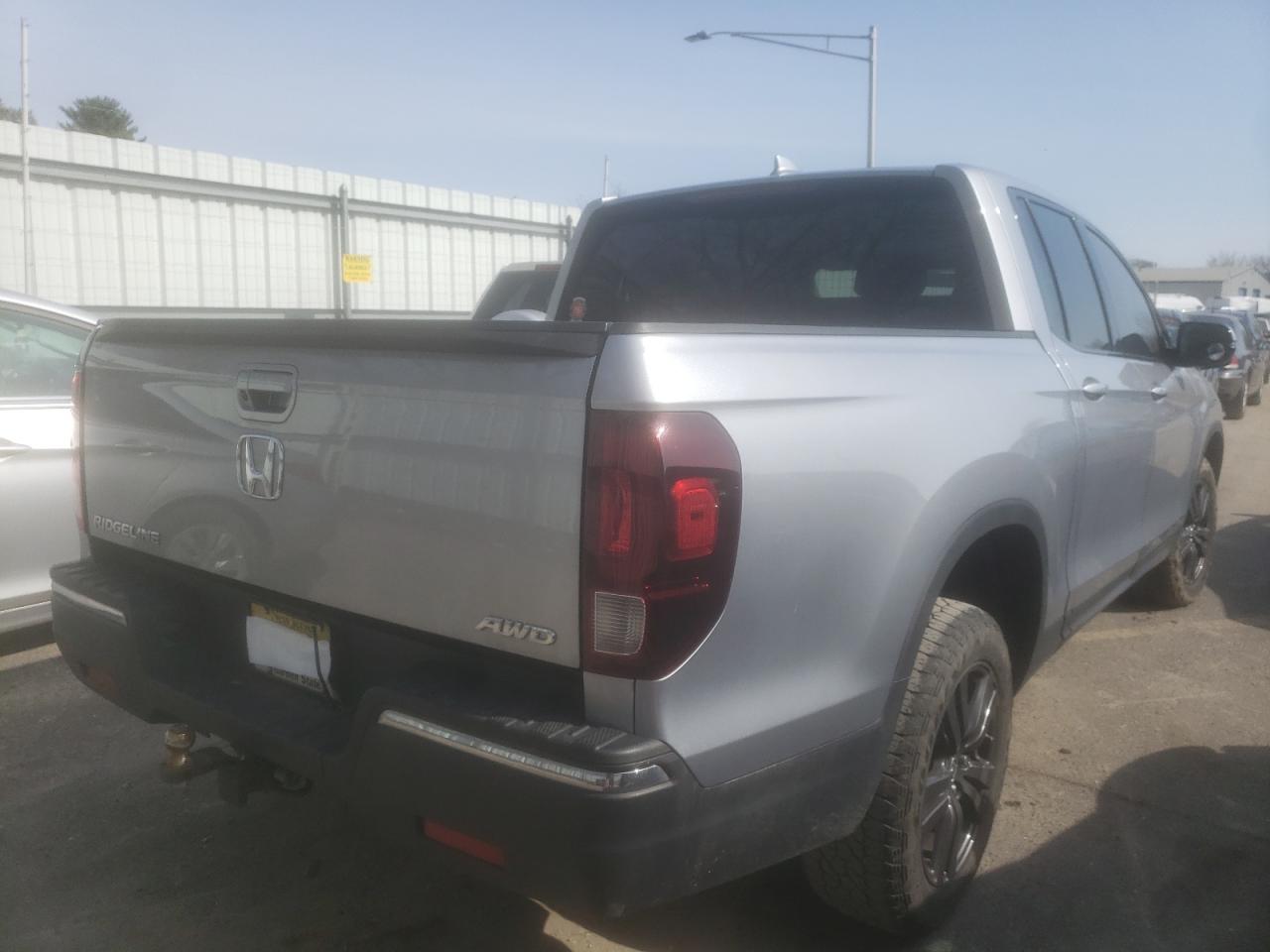 Photo 4 from auction – 2019 HONDA RIDGELINE with VIN 5FPYK3F17KB045303