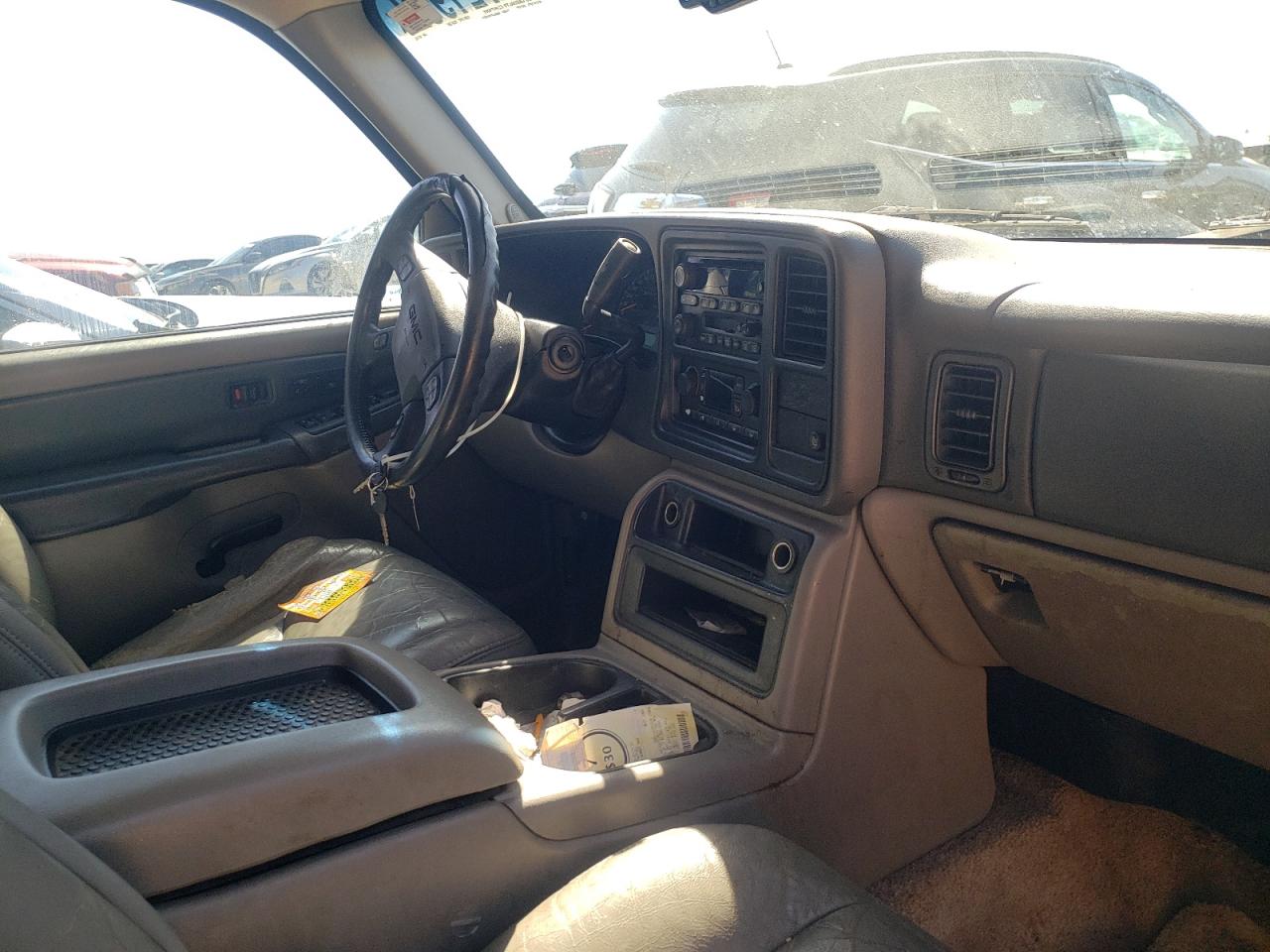 Photo 9 from auction – 2003 GMC YUKON with VIN 1GKEC13Z53R181145
