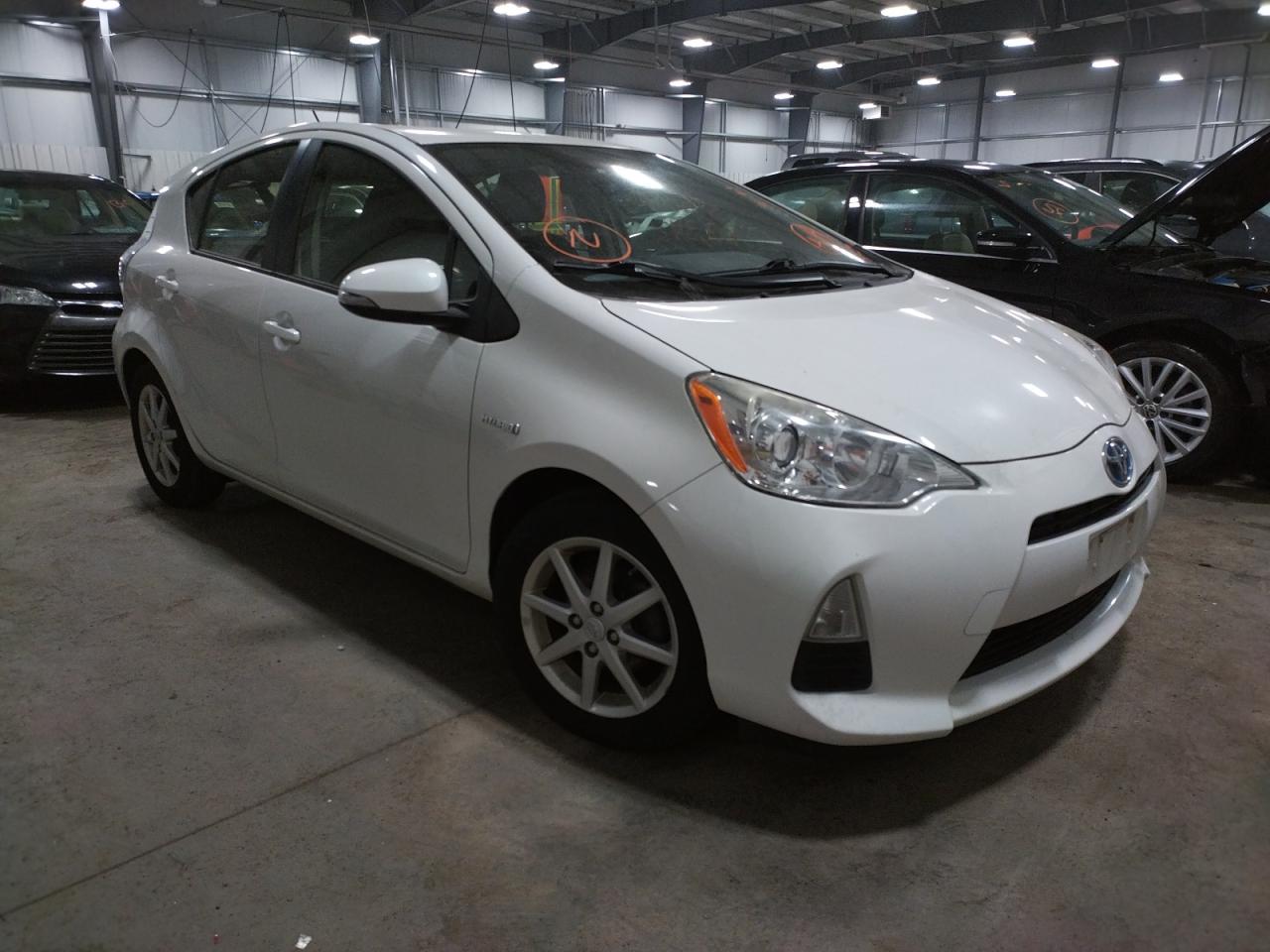 TOYOTA PRIUS C 2012 with VIN JTDKDTB38C1514084 - Photo from auction