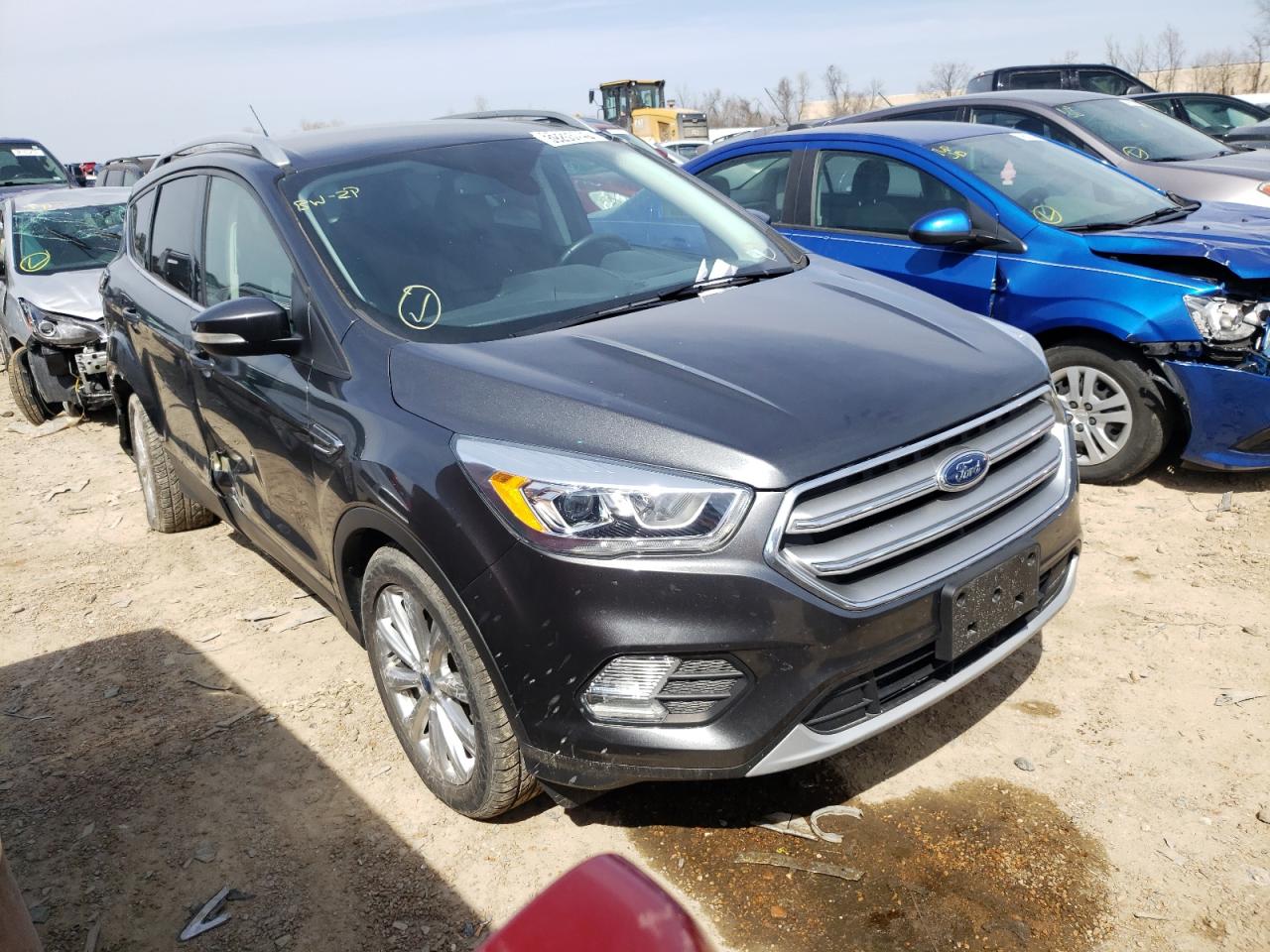 FORD ESCAPE TIT 2017 with VIN 1FMCU0JD0HUE05603 - Photo from auction