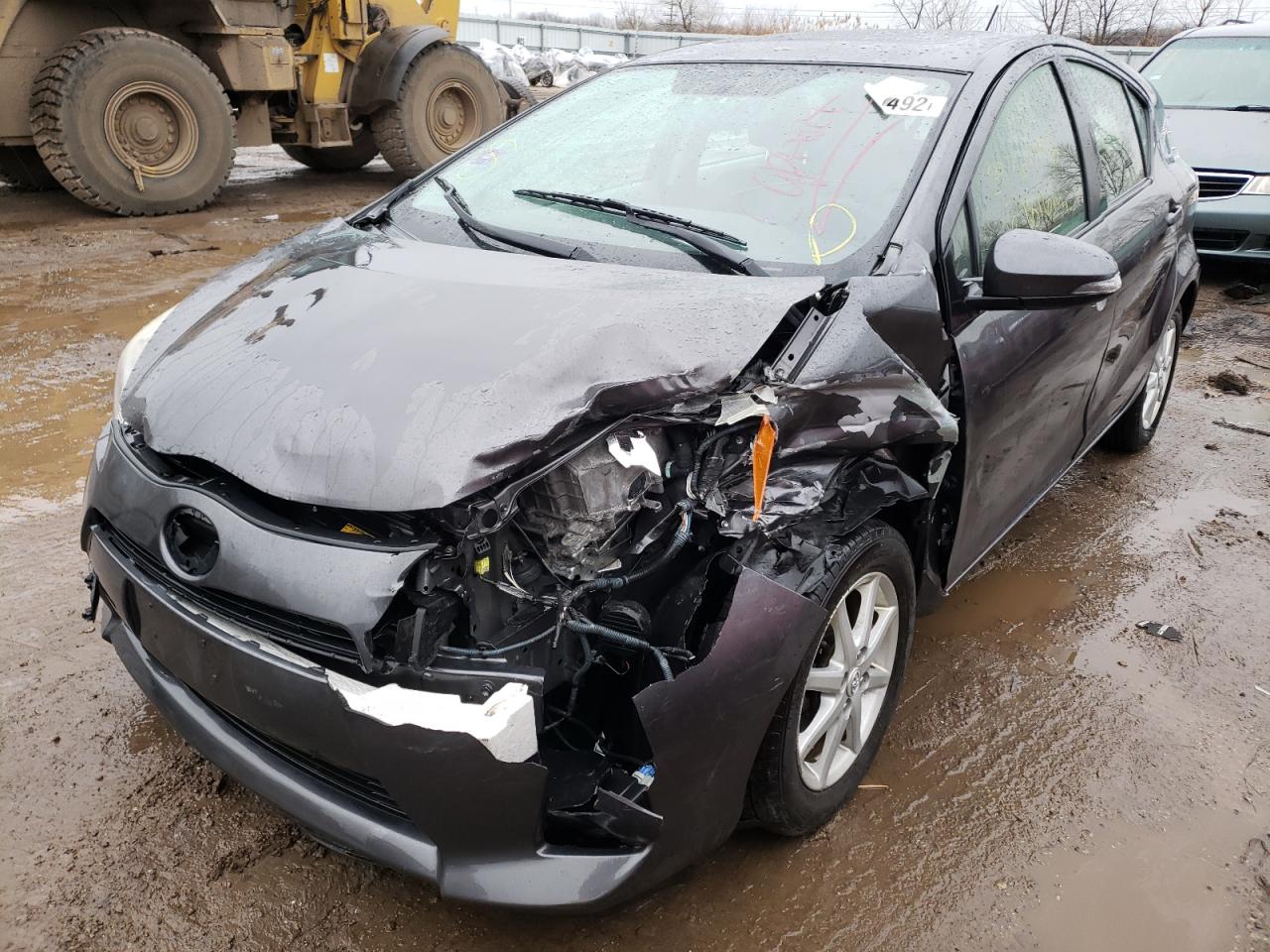 Photo 2 from auction – 2012 TOYOTA PRIUS C with VIN JTDKDTB31C1029950