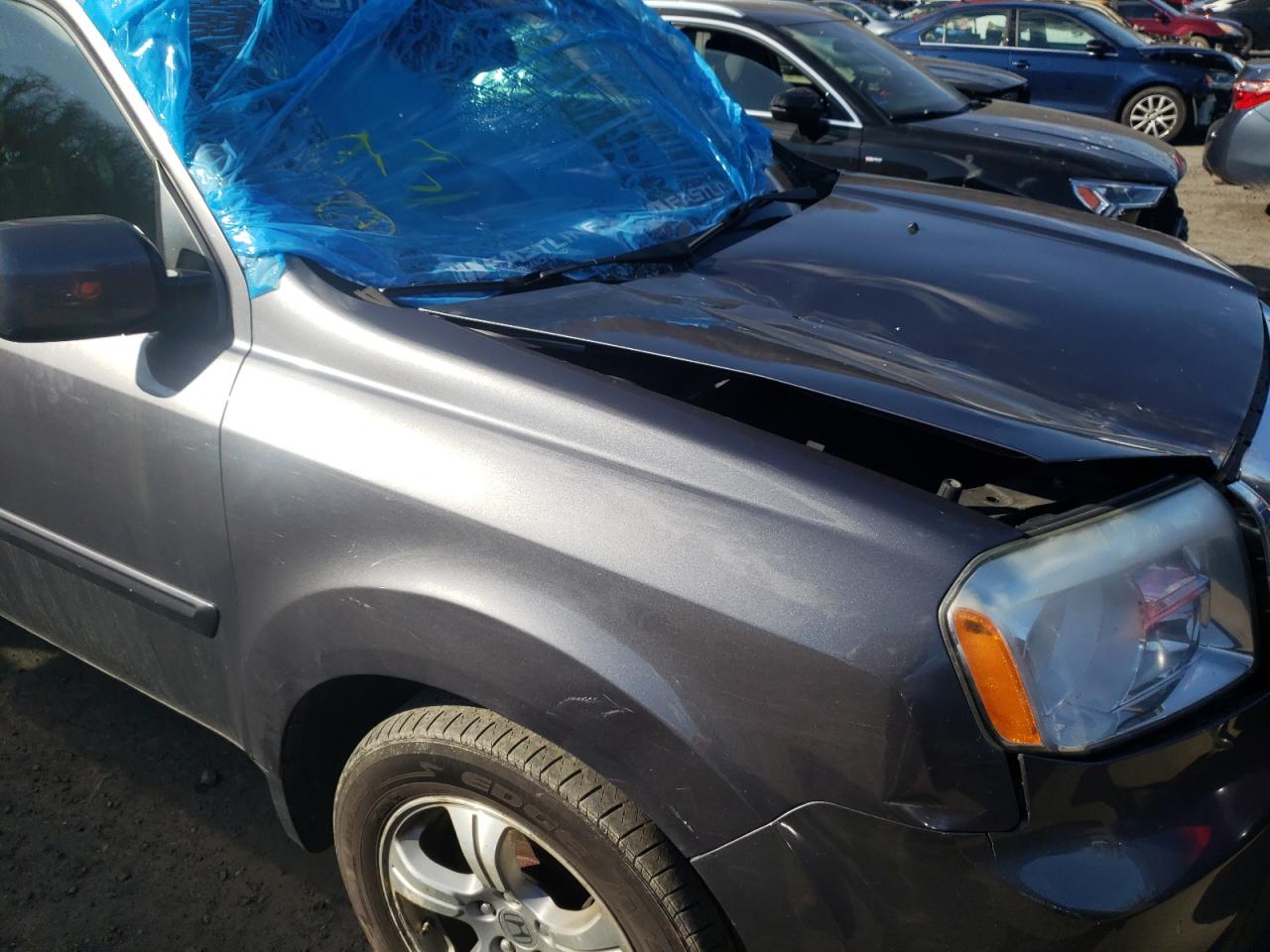 Photo 9 from auction – 2014 HONDA PILOT EXL with VIN 5FNYF4H57EB012843