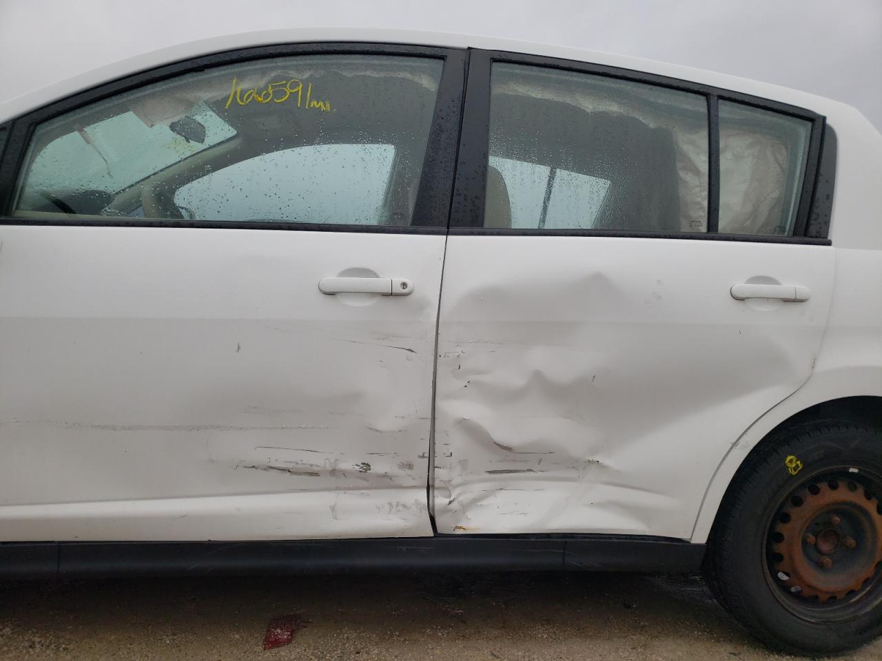 Photo 9 from auction – 2011 NISSAN VERSA S with VIN 3N1BC1CP7BL433841
