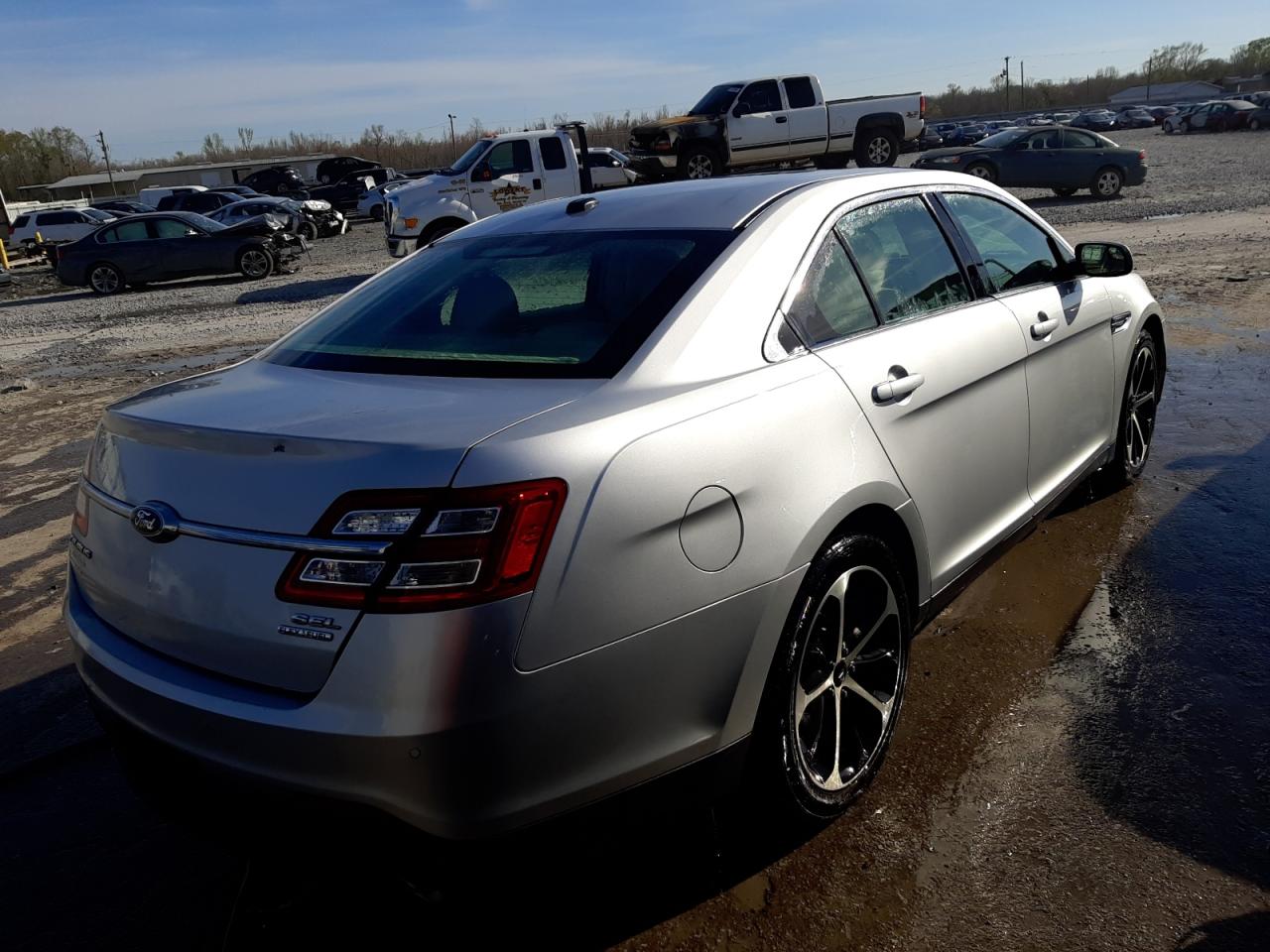 Photo 4 from auction – 2014 FORD TAURUS SEL with VIN 1FAHP2E89EG130579