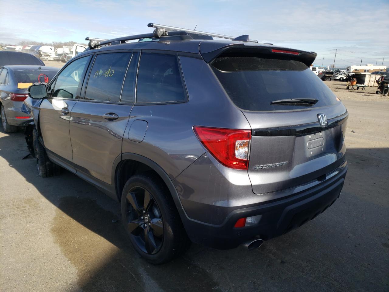 Photo 3 from auction – 2020 HONDA PASSPORT E with VIN 5FNYF8H02LB014184