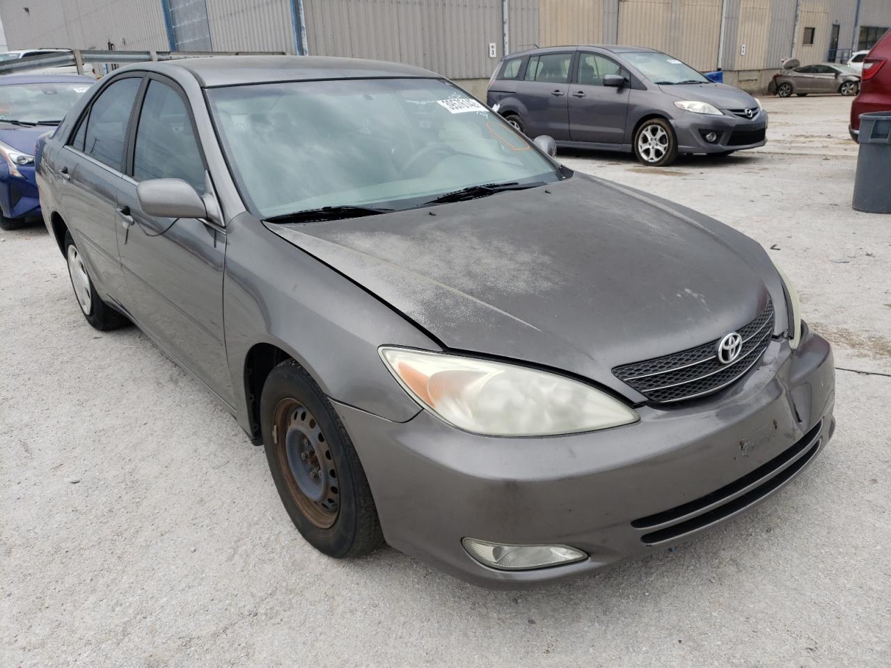 TOYOTA CAMRY LE 2003 with VIN JTDBE32K030143626 - Photo from auction