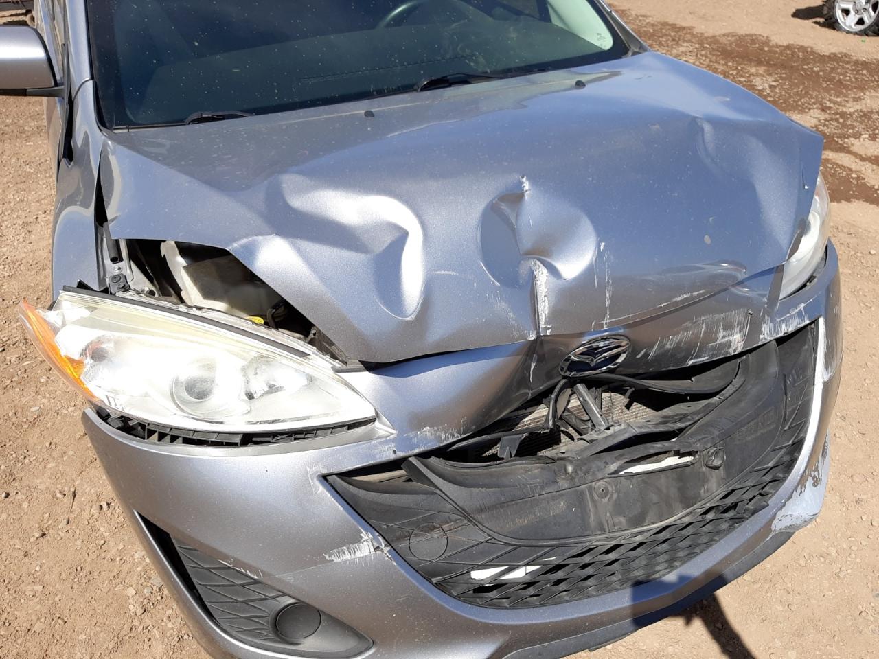 Photo 9 from auction – 2015 MAZDA 5 SPORT with VIN JM1CW2BL5F0185718