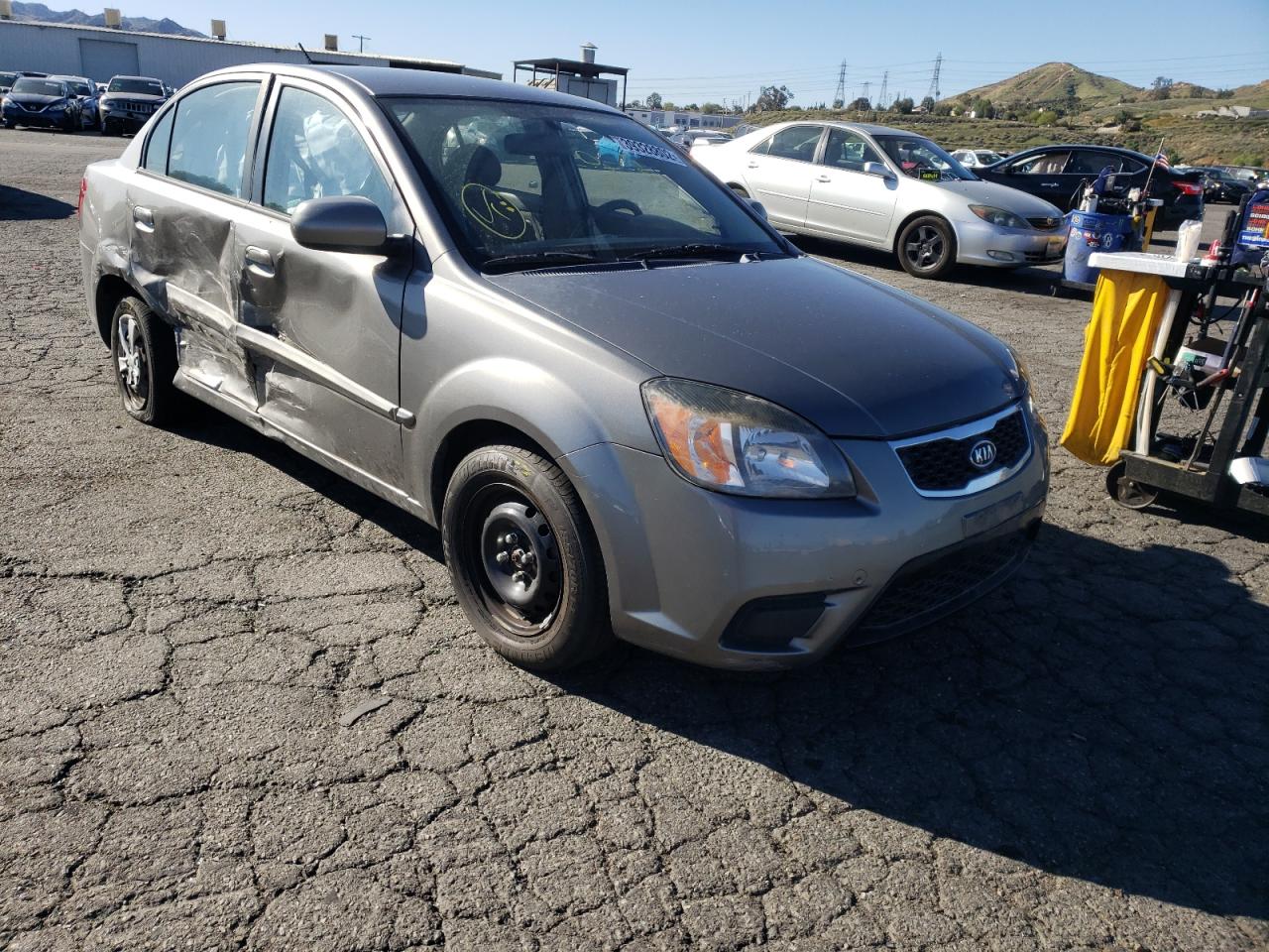 KIA RIO BASE 2011 with VIN KNADH4A32B6949914 - Photo from auction