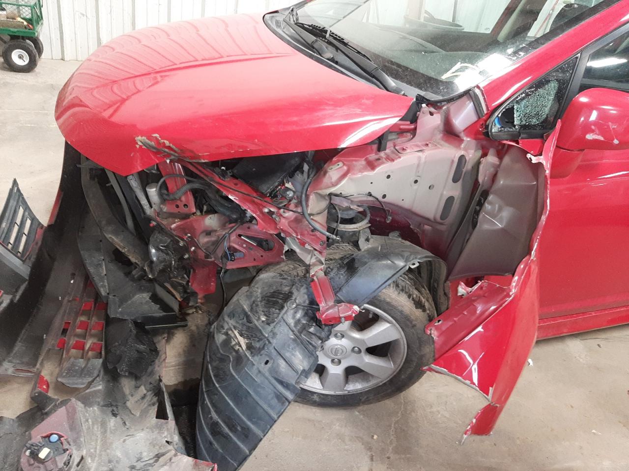 Photo 9 from auction – 2010 NISSAN VERSA S with VIN 3N1BC1CP6AL385635