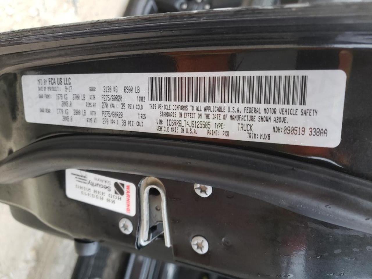 Photo 10 from auction – 2018 RAM 1500 SLT with VIN 1C6RR6LT4JS125585