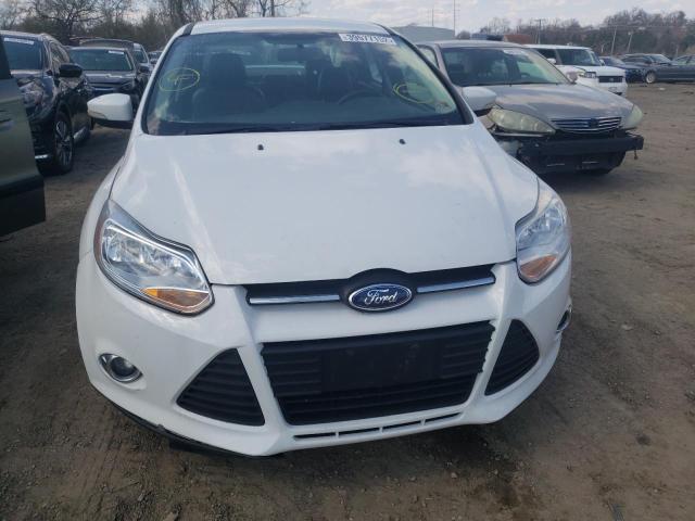 Photo 9 from auction – 2014 FORD FOCUS SE with VIN 1FADP3F28EL307127