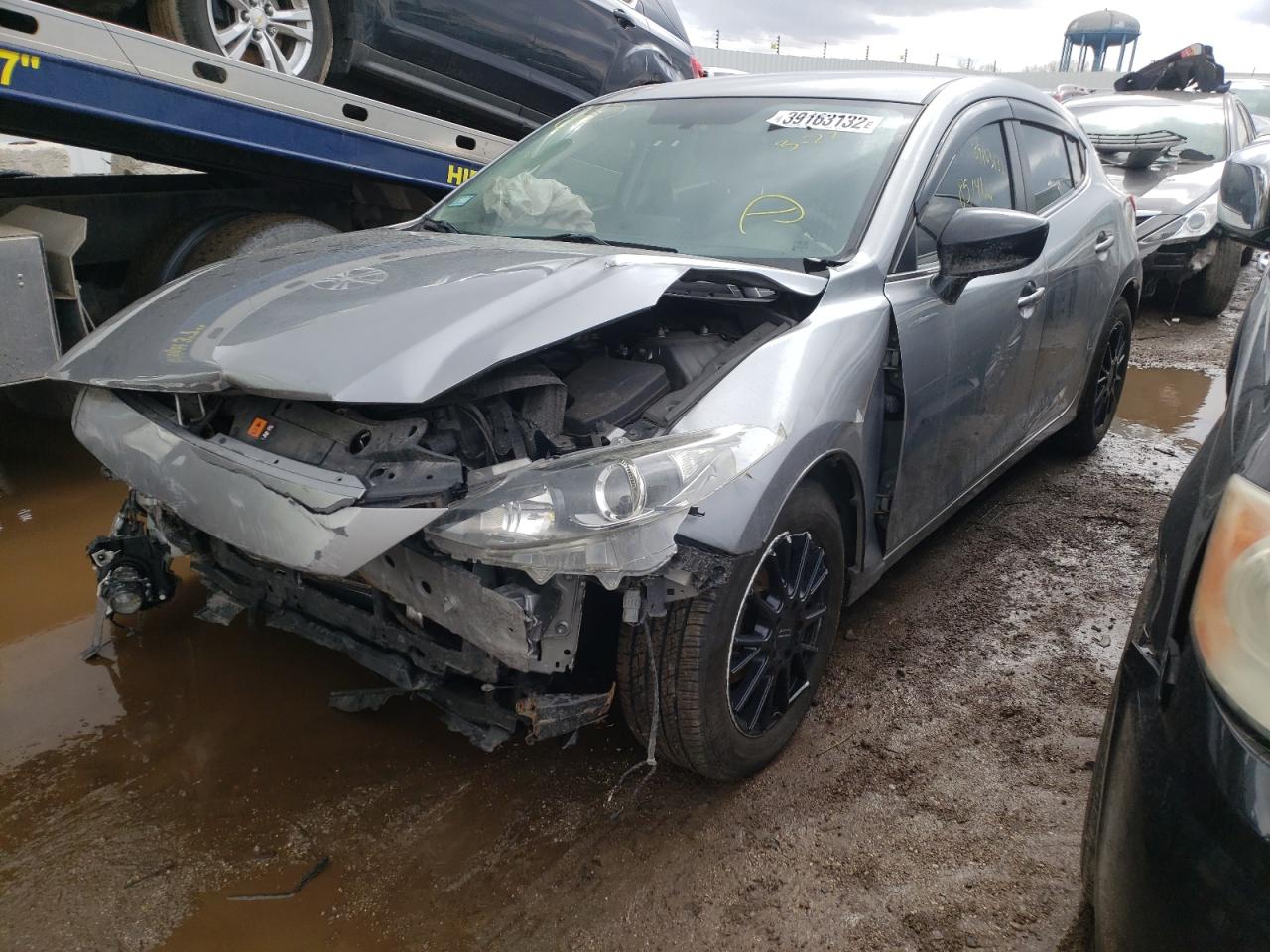 Photo 2 from auction – 2014 MAZDA 3 TOURING with VIN JM1BM1L79E1101549