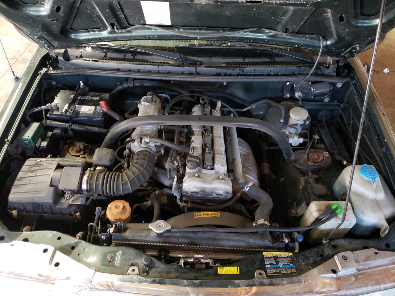 Photo 7 from auction – 2003 CHEVROLET TRACKER with VIN 2CNBJ13C036942932