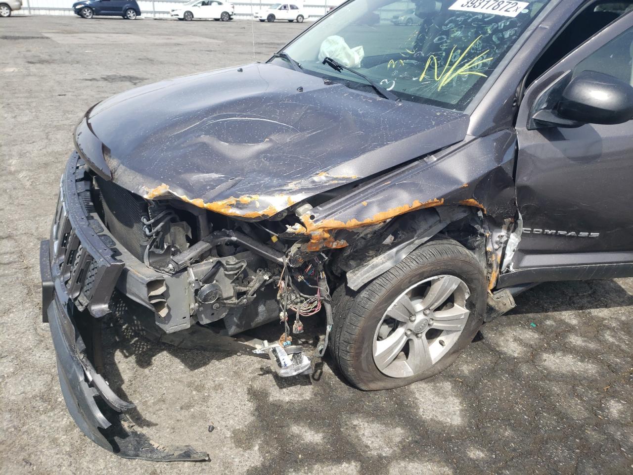 Photo 9 from auction – 2015 JEEP COMPASS SP with VIN 1C4NJCBB3FD210404
