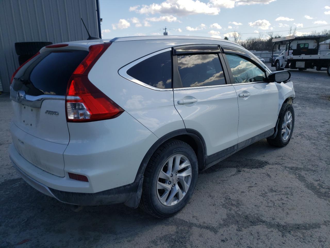 Photo 4 from auction – 2015 HONDA CR-V EXL with VIN 5J6RM4H76FL088803