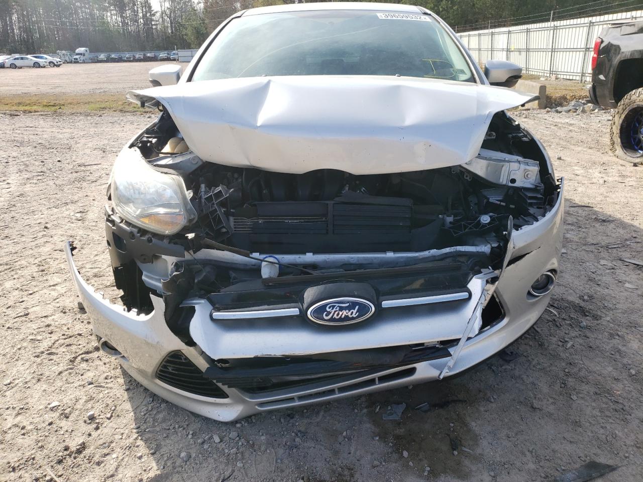 Photo 9 from auction – 2014 FORD FOCUS TITA with VIN 1FADP3N28EL269013