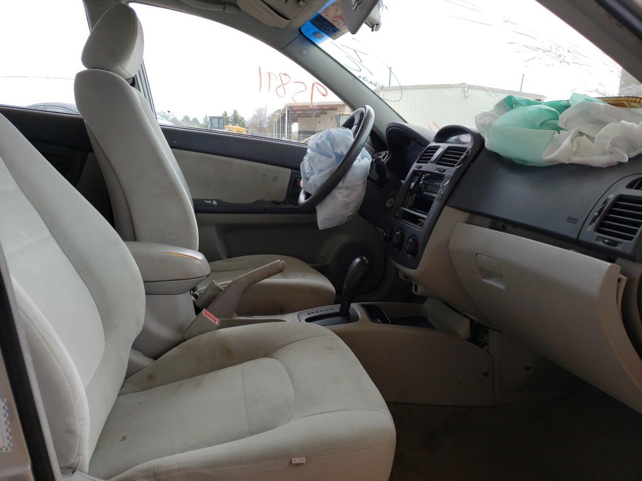 Photo 5 from auction – 2004 KIA SPECTRA LX with VIN KNAFE121X45021080