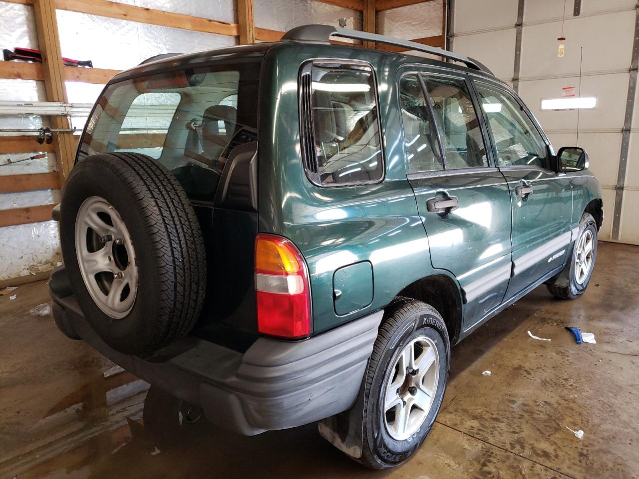 Photo 4 from auction – 2003 CHEVROLET TRACKER with VIN 2CNBJ13C036942932