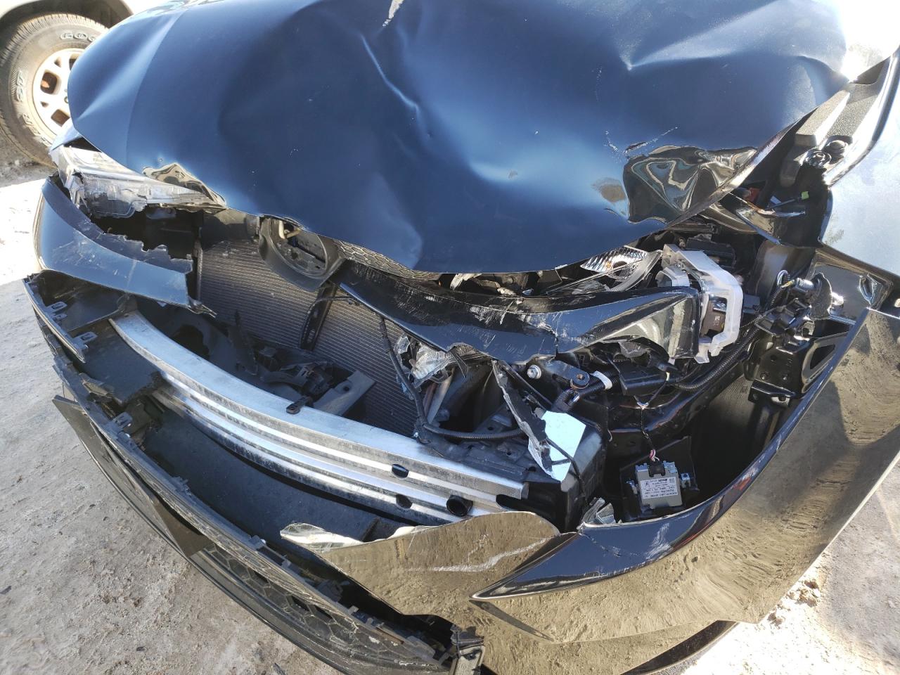 Photo 9 from auction – 2021 TOYOTA COROLLA LE with VIN JTDVPMAE2MJ133829