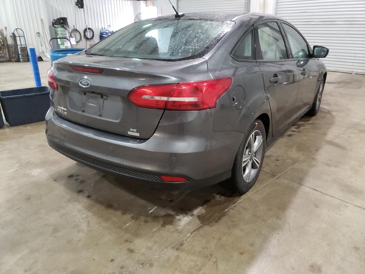Photo 4 from auction – 2016 FORD FOCUS SE with VIN 1FADP3FE5GL393526