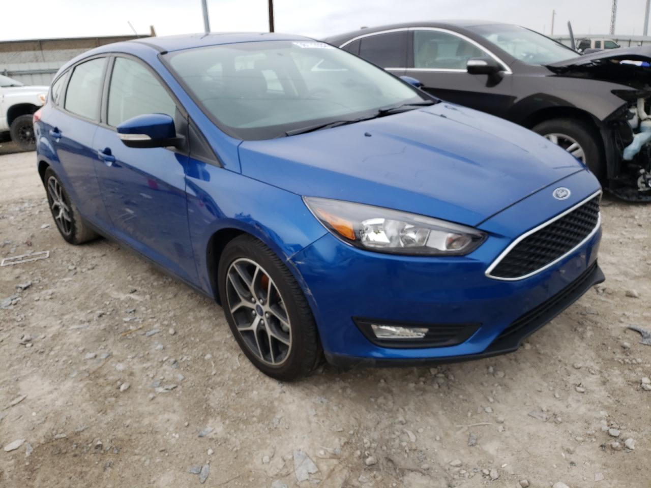 FORD FOCUS SEL 2018 with VIN 1FADP3M22JL228498 - Photo from auction