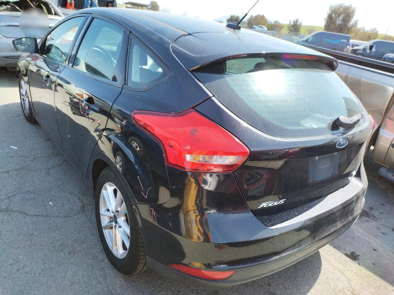 Photo 3 from auction – 2015 FORD FOCUS SE with VIN 1FADP3K22FL204681