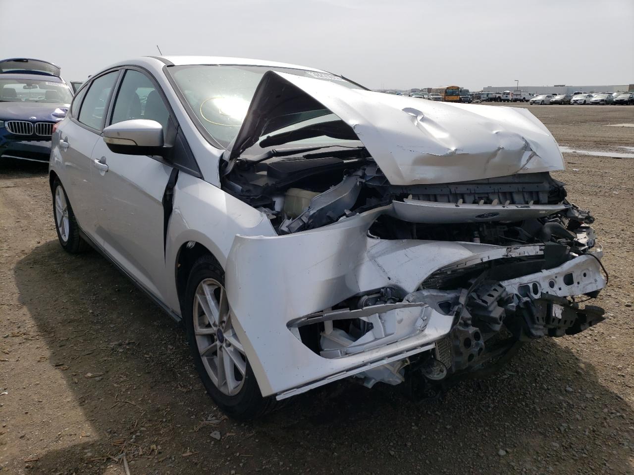 FORD FOCUS SE 2016 with VIN 1FADP3K27GL306639 - Photo from auction