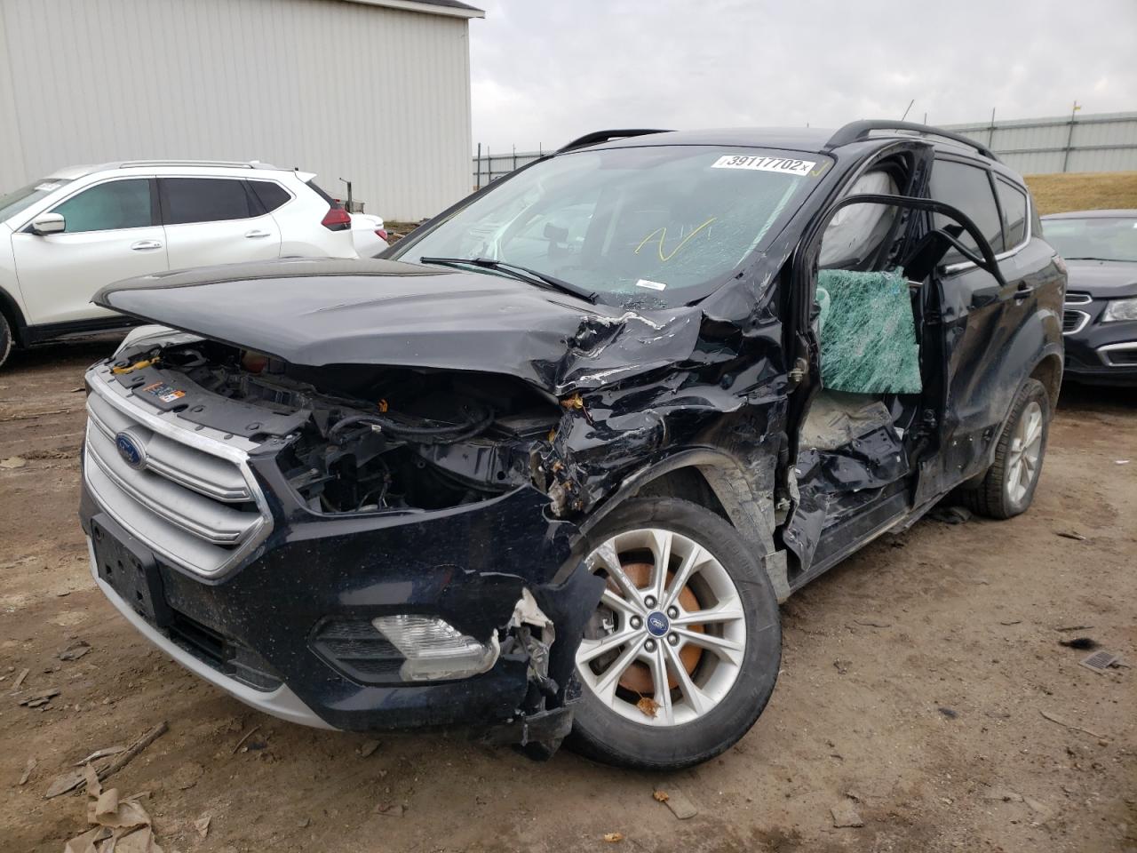 Photo 2 from auction – 2017 FORD ESCAPE SE with VIN 1FMCU9GDXHUA01784