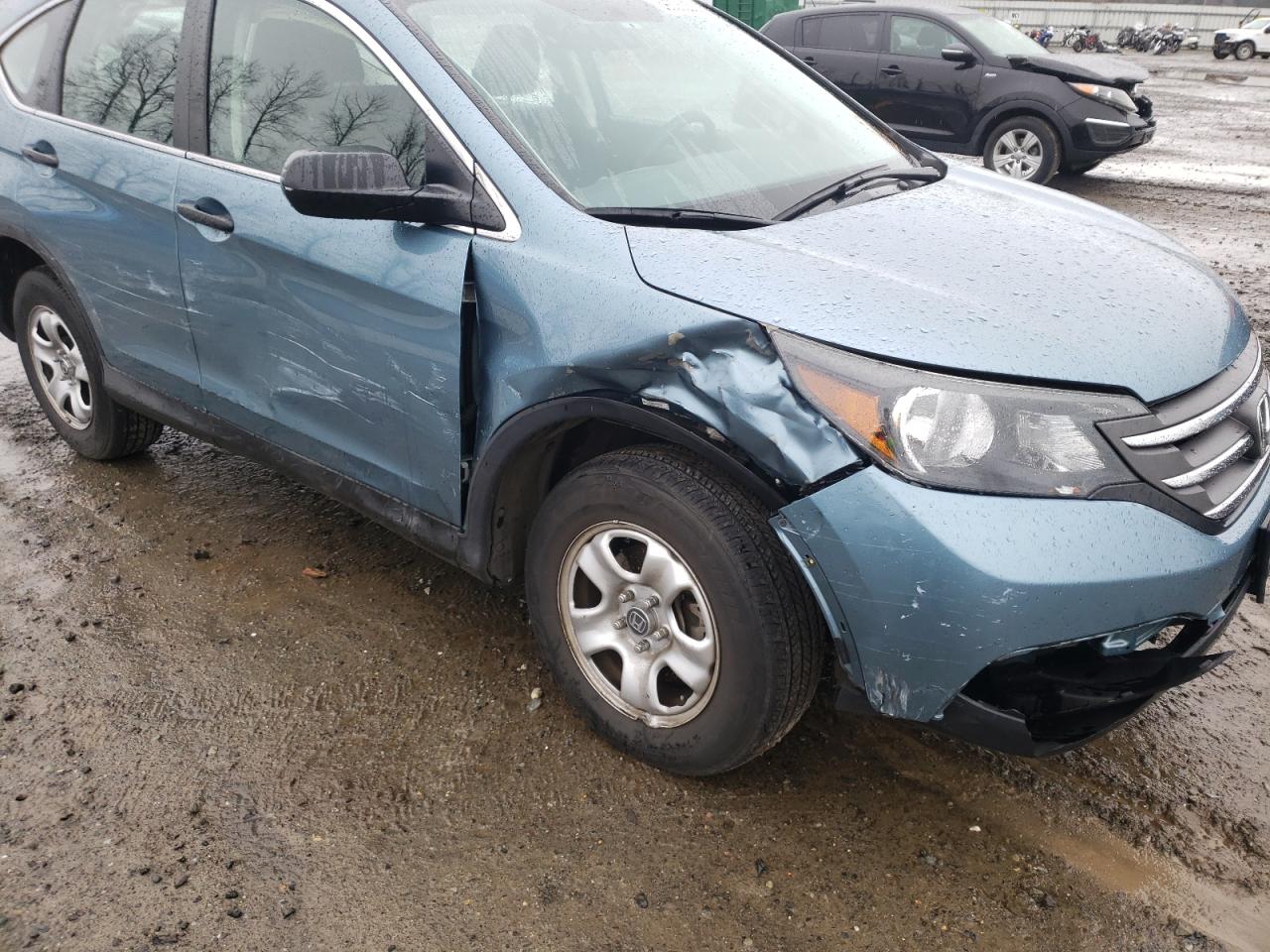 Photo 9 from auction – 2014 HONDA CR-V LX with VIN 2HKRM4H39EH637089
