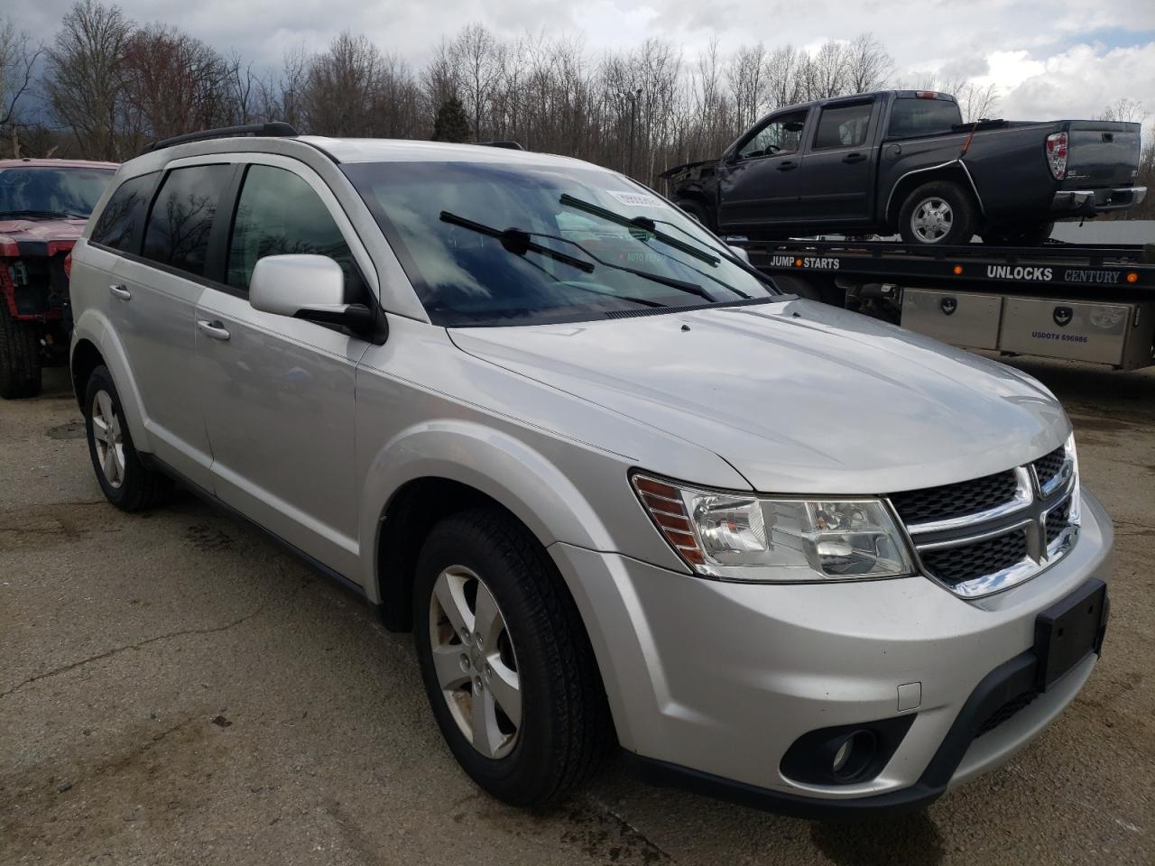 DODGE JOURNEY MA 2011 with VIN 3D4PG1FG0BT544124 - Photo from auction