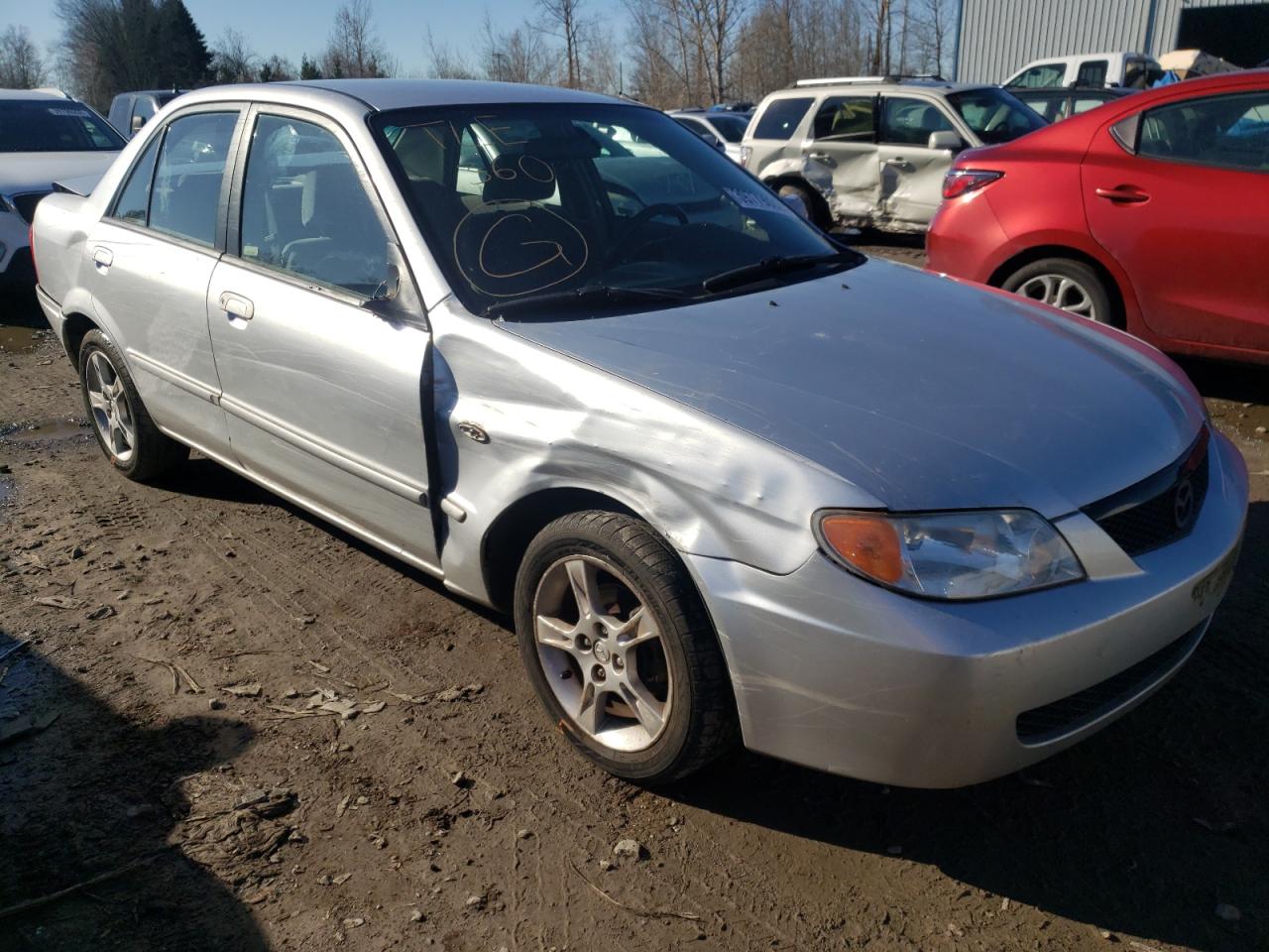 MAZDA PROTEGE 2003 with VIN JM1BJ225430173731 - Photo from auction