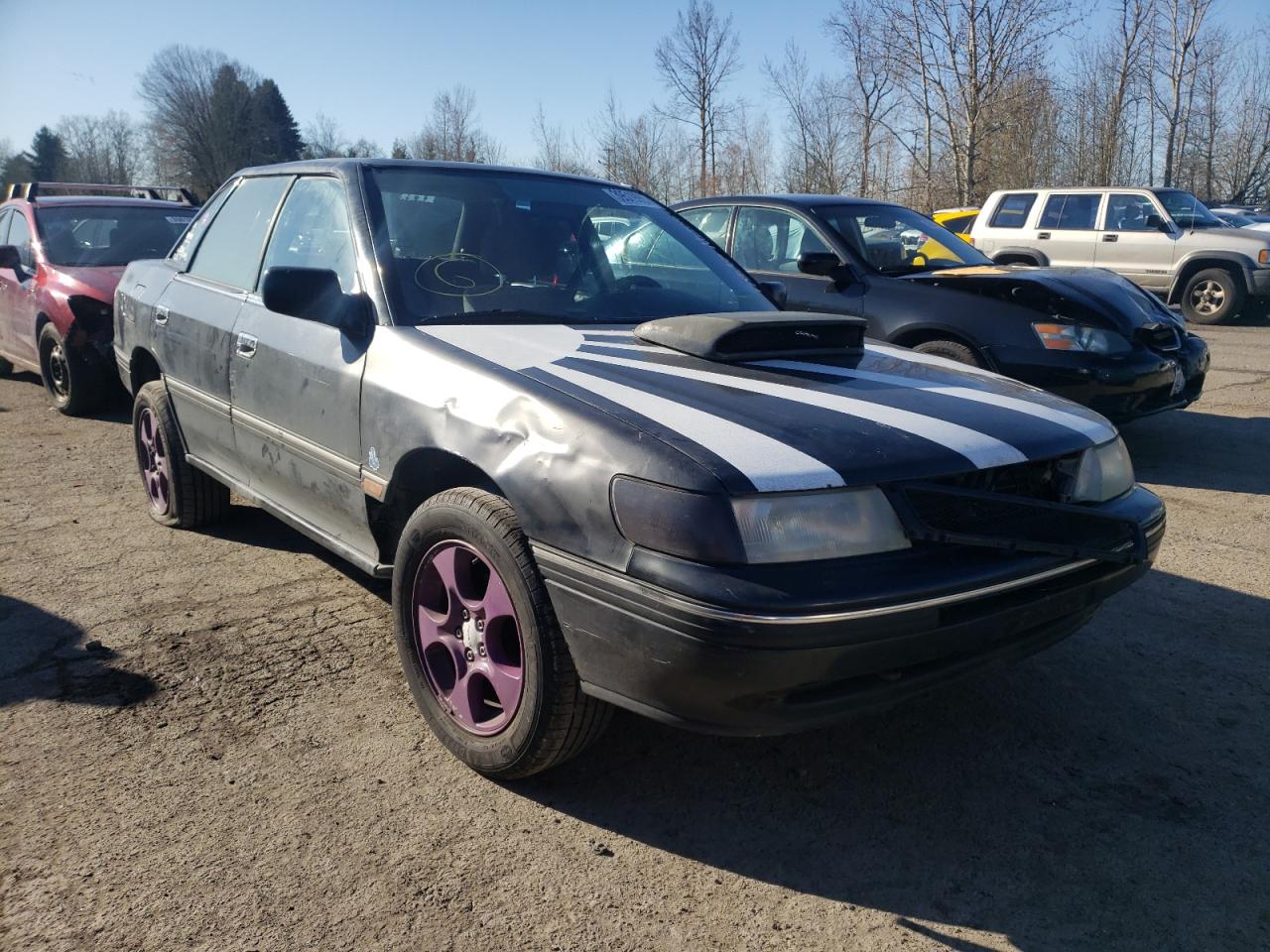 SUBARU LEGACY L 1993 with VIN 4S3BC633XP7658886 - Photo from auction