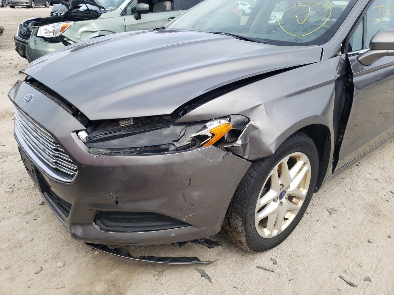 Photo 9 from auction – 2014 FORD FUSION SE with VIN 3FA6P0H71ER208568