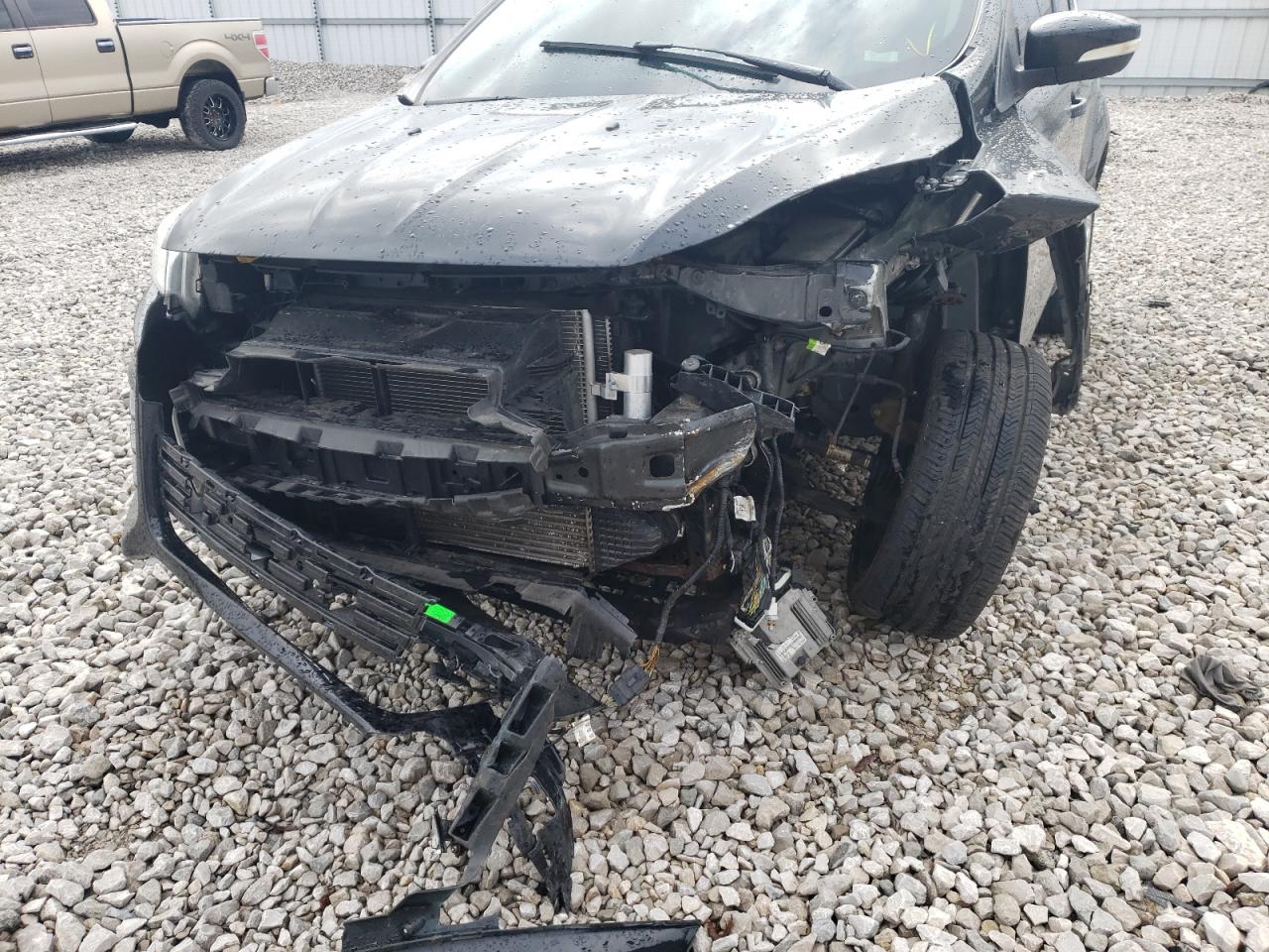 Photo 9 from auction – 2015 FORD ESCAPE TIT with VIN 1FMCU0J99FUB00898