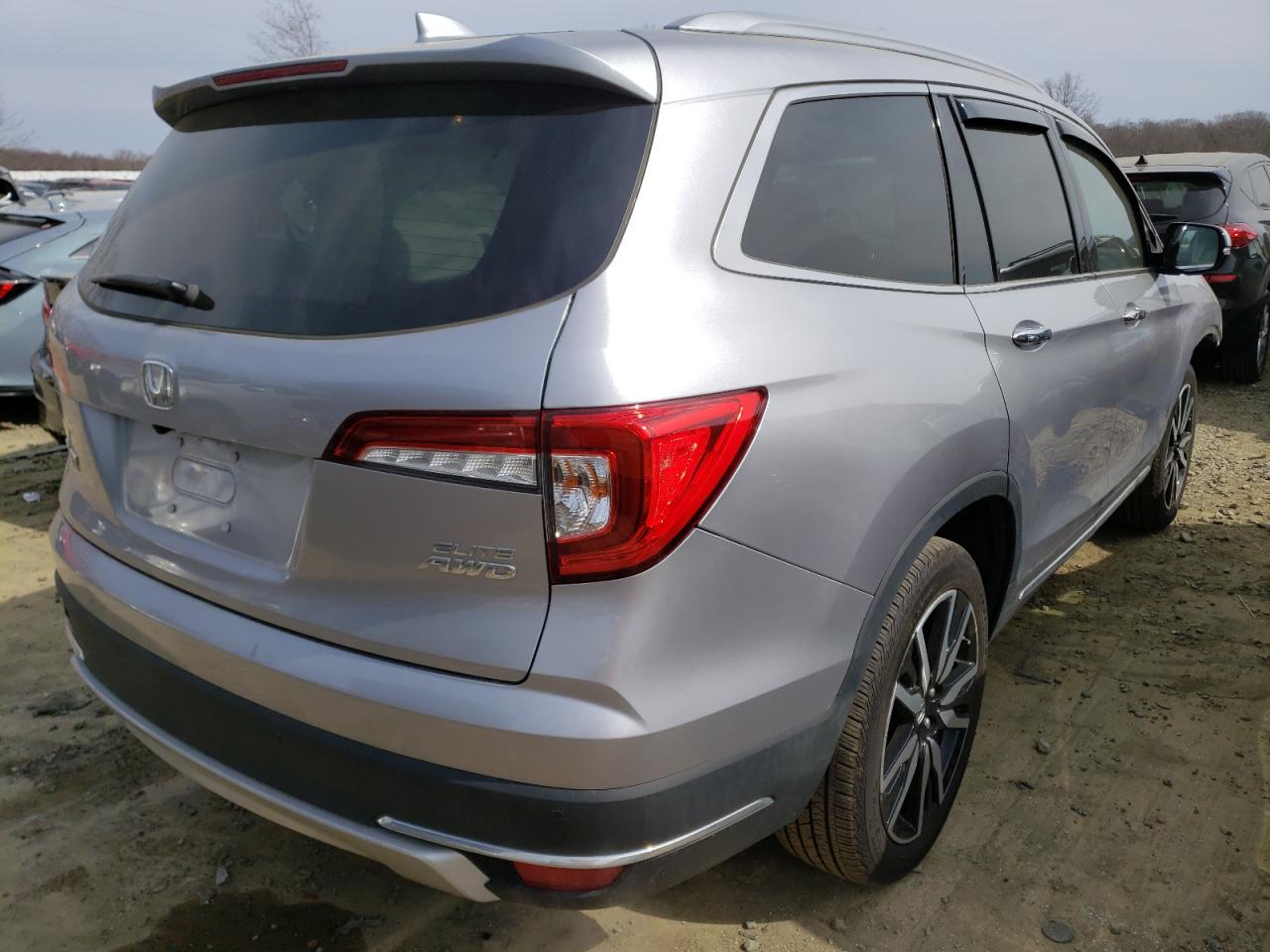 Photo 4 from auction – 2021 HONDA PILOT ELIT with VIN 5FNYF6H07MB019709