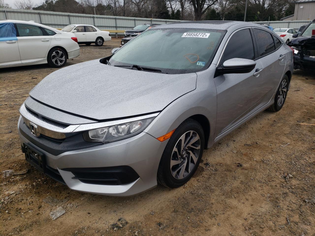 Photo 2 from auction – 2018 HONDA CIVIC EX with VIN 19XFC2F77JE026864