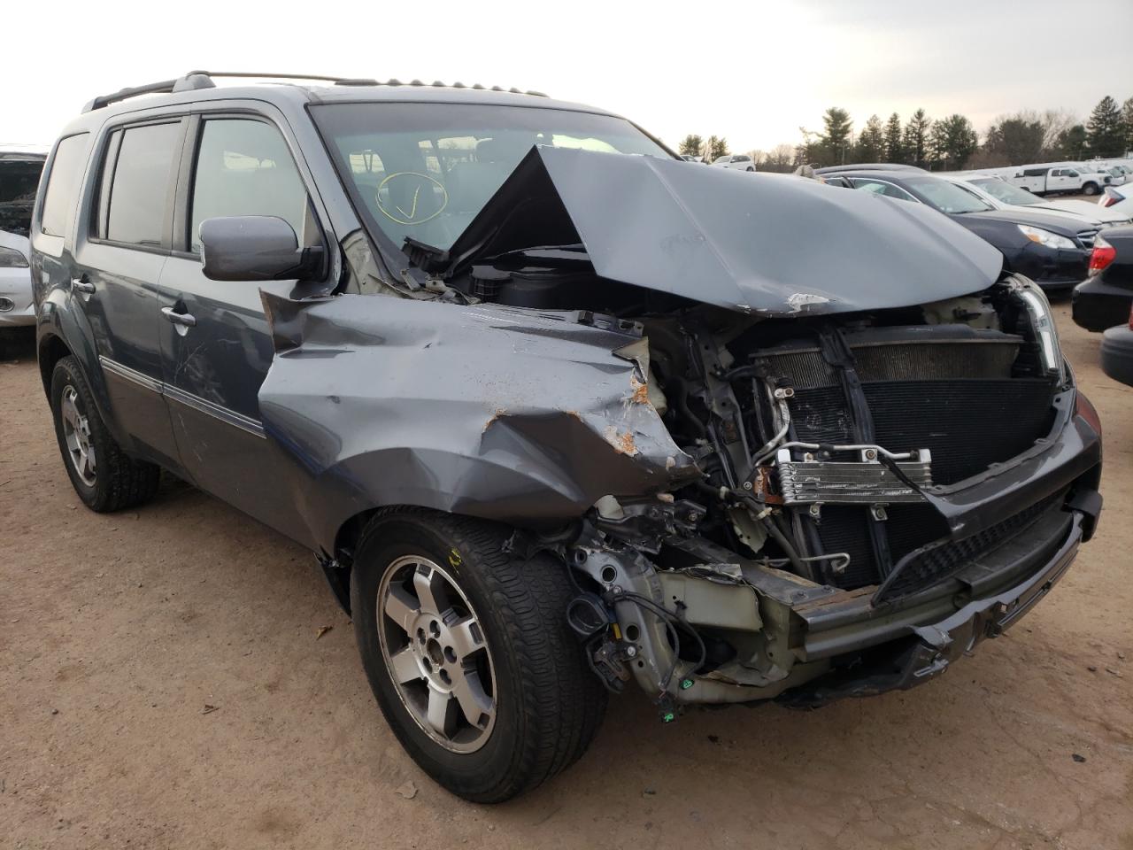HONDA PILOT TOUR 2011 with VIN 5FNYF4H90BB105265 - Photo from auction